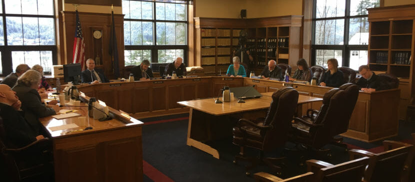 The Alaska Legislative Council waits for its Tuesday meeting to begin. The council voted to allow Sen. David Wilson to view a security video of a June incident that raised concerns about the Legislature's sexual and other workplace harassment policy. (Photo by Andrew Kitchenman/KTOO)