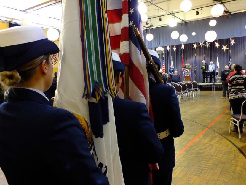 A Coast Guard color guard stand ready during a Veterans Day observance at the Juneau Arts and Culture Center on Nov. 11, 2017. (Photo by Matt Miller/KTOO)