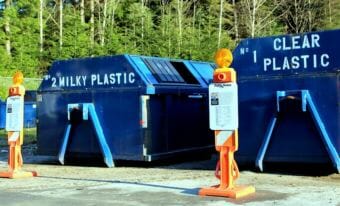 Sitka's recycling center has separate bins for different materials. But mixed paper containers are gone, due to new restrictions tied to import rules in China. (Photo by Robert Woolsey/KCAW)