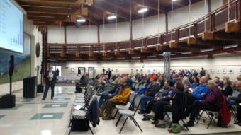 About 130 people showed up at the first Sandbox Group Meeting at Pioneer Park’s Exhibition Hall. The second meeting, which drew about 70, began at 6 p.m. and ended after 10, due to an extended question-and-answer period. (Photo by Tim Ellis/KUAC)