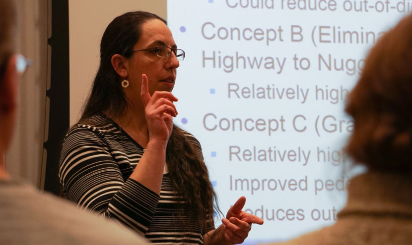 Kinney Engineering Project Manager Jeanne Bowie shares concepts for improving the safety of the intersection of Egan and Yandukin drives on Dec. 12, 2017. About 70 people attended the informational meeting at the Mendenhall Valley library.