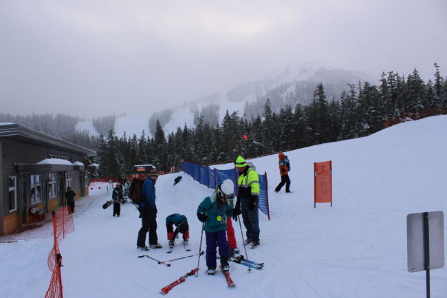 Skiers and snowboarders prepare to head for the slopes on Opening Day at Eaglecrest Ski Area. (Photo by Adelyn Baxter/KTOO)