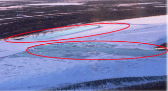 Two open holes sit on the Kuskokwim River below Tuluksak where the short cut slough enters the main channel. Bethel Search and Rescue says that there is no safe place to make a river trail at this time. (Photo courtesy Bethel Search and Rescue)
