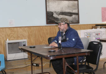 Nick Kameroff testifies at a public meeting and hearing in Aniak on January 17. State regulators traveled to Aniak, Bethel, and Anchorage to discuss permits for the Donlin Gold Mine. (Photo courtesy Dave Cannon)