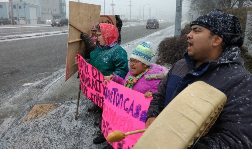 On Egan Drive in Juneau, Matthew Carlson, 35, beats a drum and sings Tlingit songs in protest on Jan. 22, 2018. Carlson, of Angoon, was protesting the City and Borough of Juneau's plans to annex parts of Admiralty Island. Carlson lives in Juneau but is originally from Angoon.