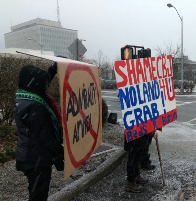 A group of residents who grew up in Angoon protest the Juneau Assembly's plans to annex parts of Admiralty Island on Jan. 22, 2018, at an intersection on Egan Drive.