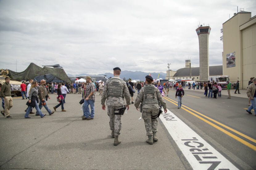 Members of the U.S. Air Force 673rd Security Forces Squadron patrol during the Arctic Thunder Open House at Joint Base Elmendorf-Richardson on July 31, 2016.