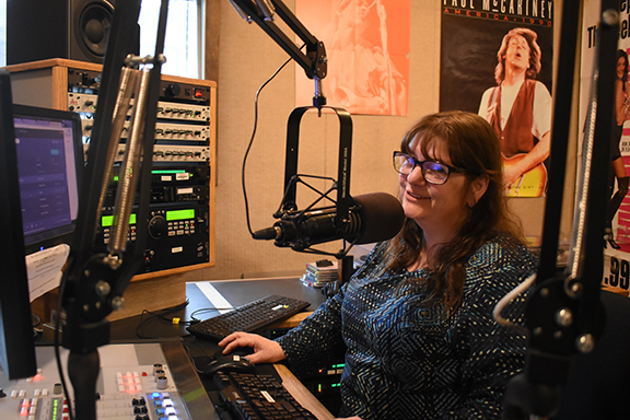 KSTK General Manager Cindy Sweat hosts morning programming for the Wrangell public radio station. (Photo by June Leffler/KSTK)