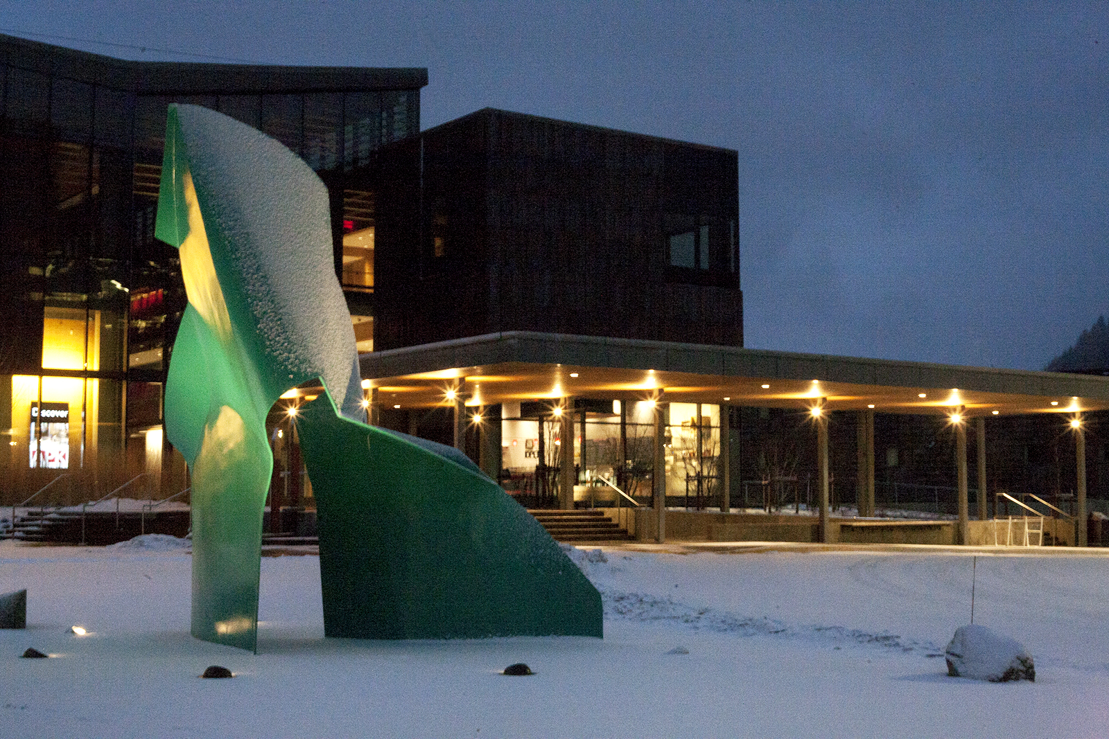 Snow accumulates on the Nimbus sculpture Monday morning, Feb. 12, 2018, outside of the Andrew P. Kashevaroff Building, which houses the State Library and Archives Museum, in Juneau, Alaska. (Photo by Tripp J Crouse/KTOO)
