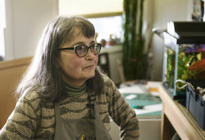 Mary Ellen Frank is the director and curator of Aunt Claudia's Dolls museum at 114 South Franklin, on the second floor of the Triangle Building. (Photo by Tripp J Crouse/KTOO)