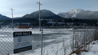 A sign notes that this 2.8-acre waterfront lot in Juneau is for sale on Feb. 14, 2018. The Alaska Mental Health Trust has listed it for sale since late 2016.