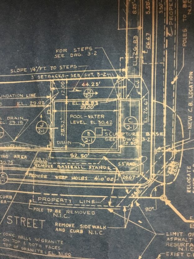 Part of a technical drawing of Juneau's Federal Building shows a sculpture at the corner of Ninth Street and Willoughby Avenue surrounded by a water feature. The drawing was in the basement of the federal building in 2017. The pool doesn't exist, but the sculpture of diving pelicans does, and they appear to be diving into pavement.