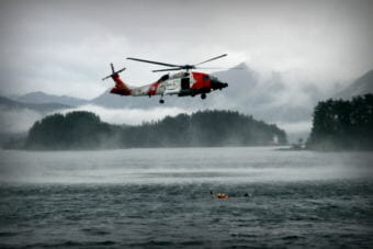 Although most people imagine the crews of Coast Guard Air Station Sitka routinely plucking mariners from sinking ships, the most common mission is the non-maritime medevac in flight conditions too treacherous for any other aircraft than the all-weather Jayhawk. Air Station Sitka also performs more terrestrial Search and Rescues (lost hunters and hikers) than any other unit in the Coast Guard. (Photo by Emily Russell/KCAW)