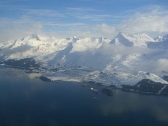 The Federal Energy Regulatory Commission has directed the Alaska Gasline Development Corporation to study the City of Valdez, shown here from the sky, as an optional route for the state's $45 billion gasline export project. (Photo by Total Heliski)