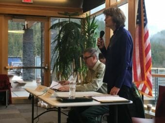 Sen. Lisa Murkowski speaks before a panel discussion about the Tongass National Forest Friday at the Ketchikan library. Seated is U.S. Forest Service Chief Tony Tooke. (Photo by Leila Kheiry/KRBD)