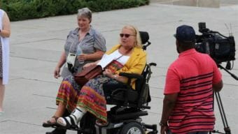 Kathy Hoell, second from left, joins another activist to advocate for disability rights at the state Capitol in Lincoln. Hoell helped Nebraska become a nationwide leader in voter access for people with disabilities. (Photo courtesy Kathy Hoell)