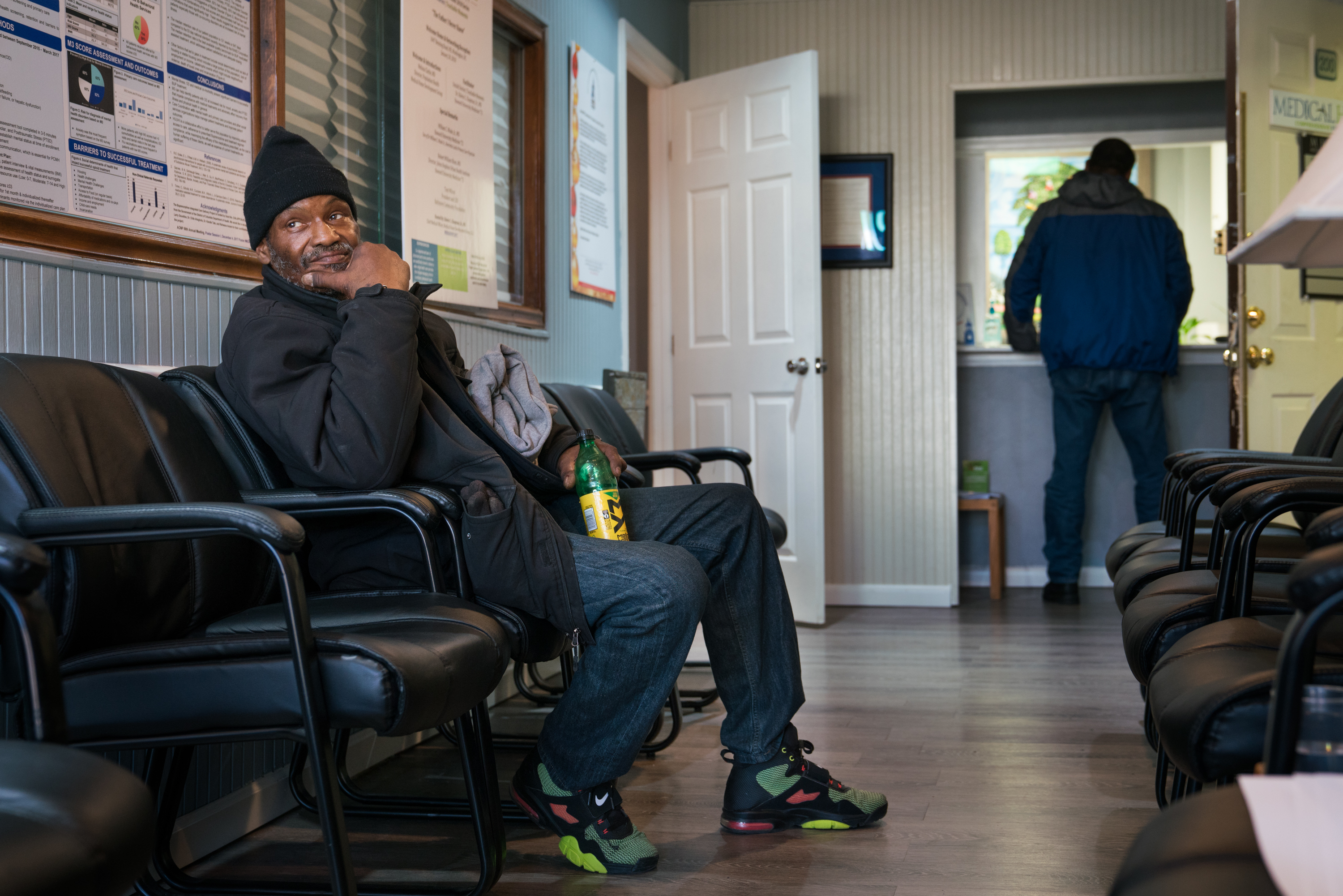 Gerald A. Goines Sr. sits in the waiting room of Dr. Chapman's clinic in Northeast Washington D.C. (Photo by Claire Harbage/NPR)