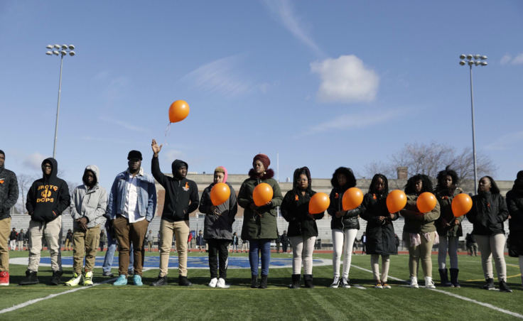 Eastern Senior High prepare to release balloons for the victims of the Florida school shooting and for victims of shootings in D.C.