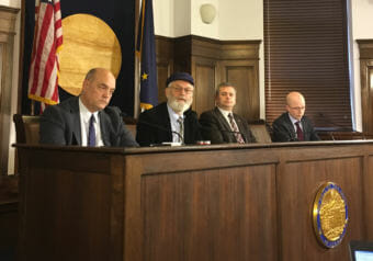 Rep. Andy Josephson, D-Anchorage; Rep. Paul Seaton, R-Homer; Rep. Chris Tuck, D-Anchorage; and Rep. Jonathan Kreiss-Tomkins, D-Sitka, attend a press availability, March, 13, 2018. They discussed a proposed constitutional amendment regarding permanent fund dividends. (Photo by Andrew Kitchenman/KTOO)