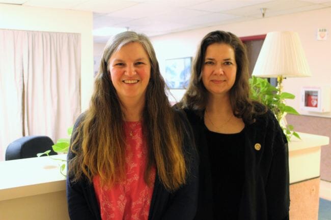 S.A.F.E. Child Advocacy Center Program Manager Susan Loesby and Erin Walker-Tolles, executive director of Catholic Community Service, at the CCS building in Juneau. (Photo by Adelyn Baxter/KTOO)