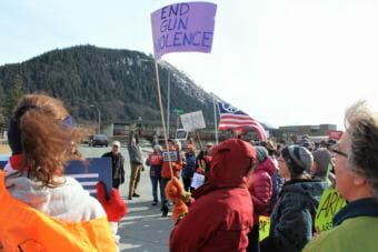 Protesters at Juneau's March for Our Lives gather outside the downtown offices of Sens. Lisa Murkowski and Dan Sullivan on March 24, 2018.
