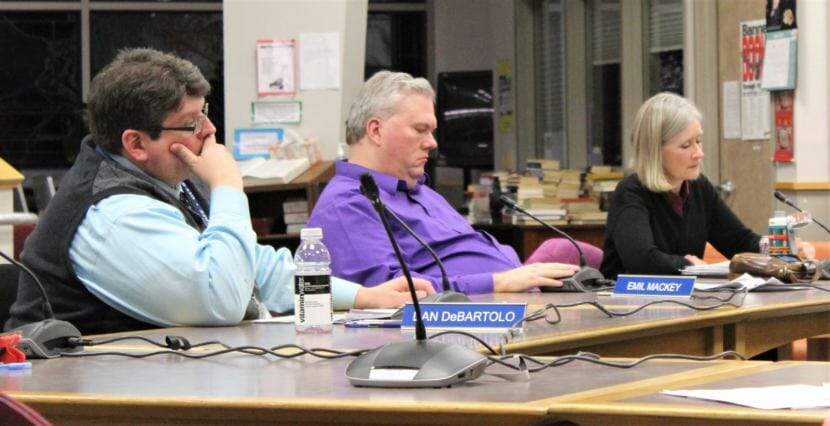 Juneau School Board members Dan DeBartolo, Emil Mackey and Andi Story prepare to vote on the FY19 district budget at a special meeting March 27, 2018. (Photo by Adelyn Baxter/KTOO)