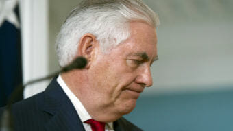 Secretary of State Rex Tillerson turns away from a podium after making a statement at the State Department in Washington, D.C., on Oct. 4, 2017, in which he did not deny having called President Trump a "moron." (Photo by Cliff Owen/AP)