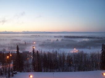 Ice fog hangs over Fairbanks during a weather inversion on Jan. 21, 2003. This is facing South from the eighth floor of Bartlett Hall at the University of Alaska Fairbanks.