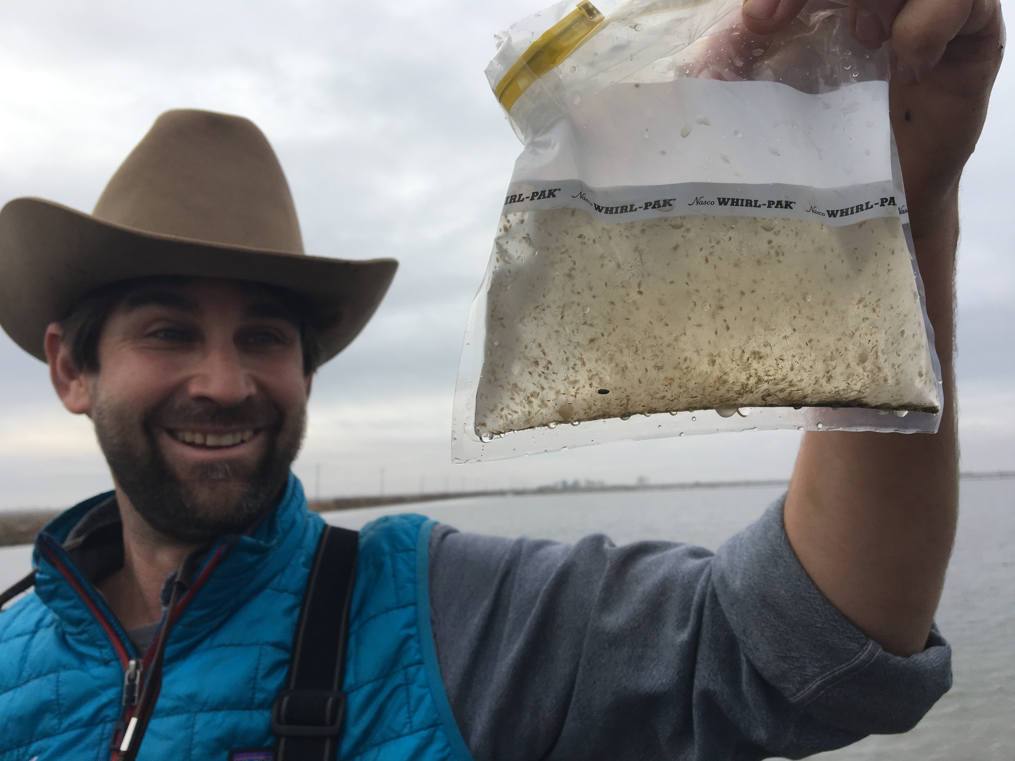 Jacob Katz, with California Trout, says growing bugs in rice fields could be part of the solution for boosting salmon populations in rivers statewide. (Ezra David Romero/Capital Public Radio)