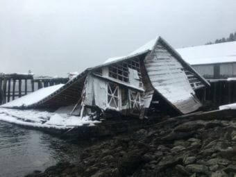 Around 3,000 gallons of oil were released into the Shuyak Strait after this building collapsed. (Photo courtesy U.S. Coast Guard)