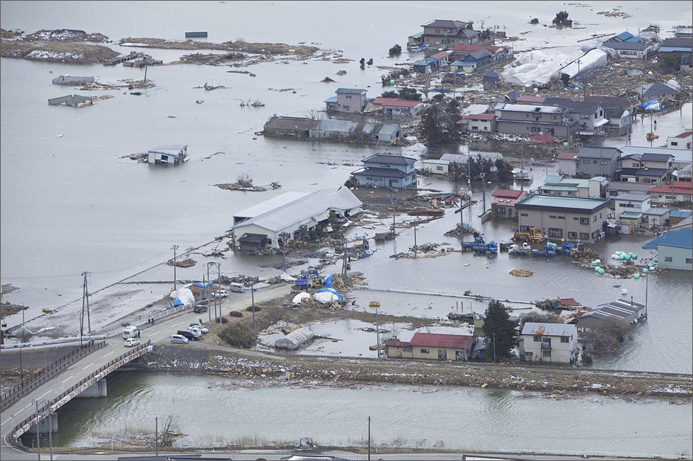 An aerial view of Ishinomaki, Japan, on March 18, 2011, one week after a devastating 9.0 magnitude earthquake and subsequent tsunami.<br /> <a href="TINYURL.COM/Y76P2EO9">Lance Cpl. Ethan Johnson/U.S. Marine Corps)</a>
