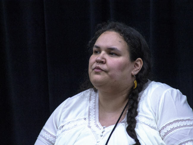 Playwright Vera Starbard listens to a question during "An Evening of Stories," an event Monday, April 23, 2018, to raise awareness of domestic violence and sexual assault, at the Elizabeth Peratrovich Hall in Juneau. (Photo by Tripp J Crouse/KTOO)