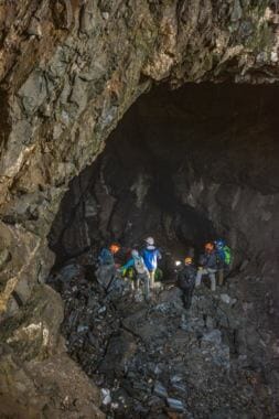Cast and crew prepare to enter a cave during 2017 filming of Alaska Treasure Hunters. (Courtesy Alaska Treasure Hunters)