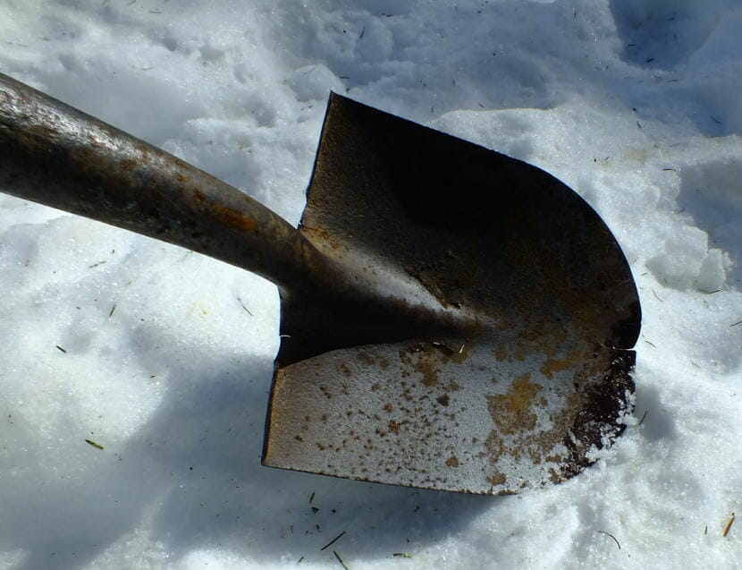This rusty and cracked shovel is in desperate need of TLC or replacement.