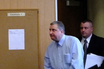 Mark De Simone leaves the courtroom at the Dimond Courthouse after Friday's opening statements in his case.