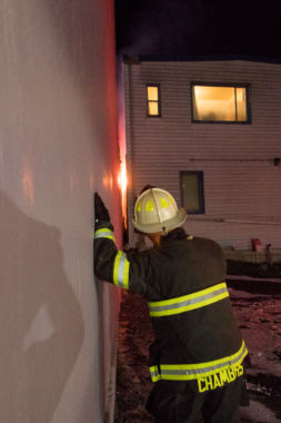 Capital City Fire/Rescue fights a fire in the 200 block of North Franklin Street on the evening of Monday, April 16, 2018. (Photo by Mikko Wilson/KTOO)