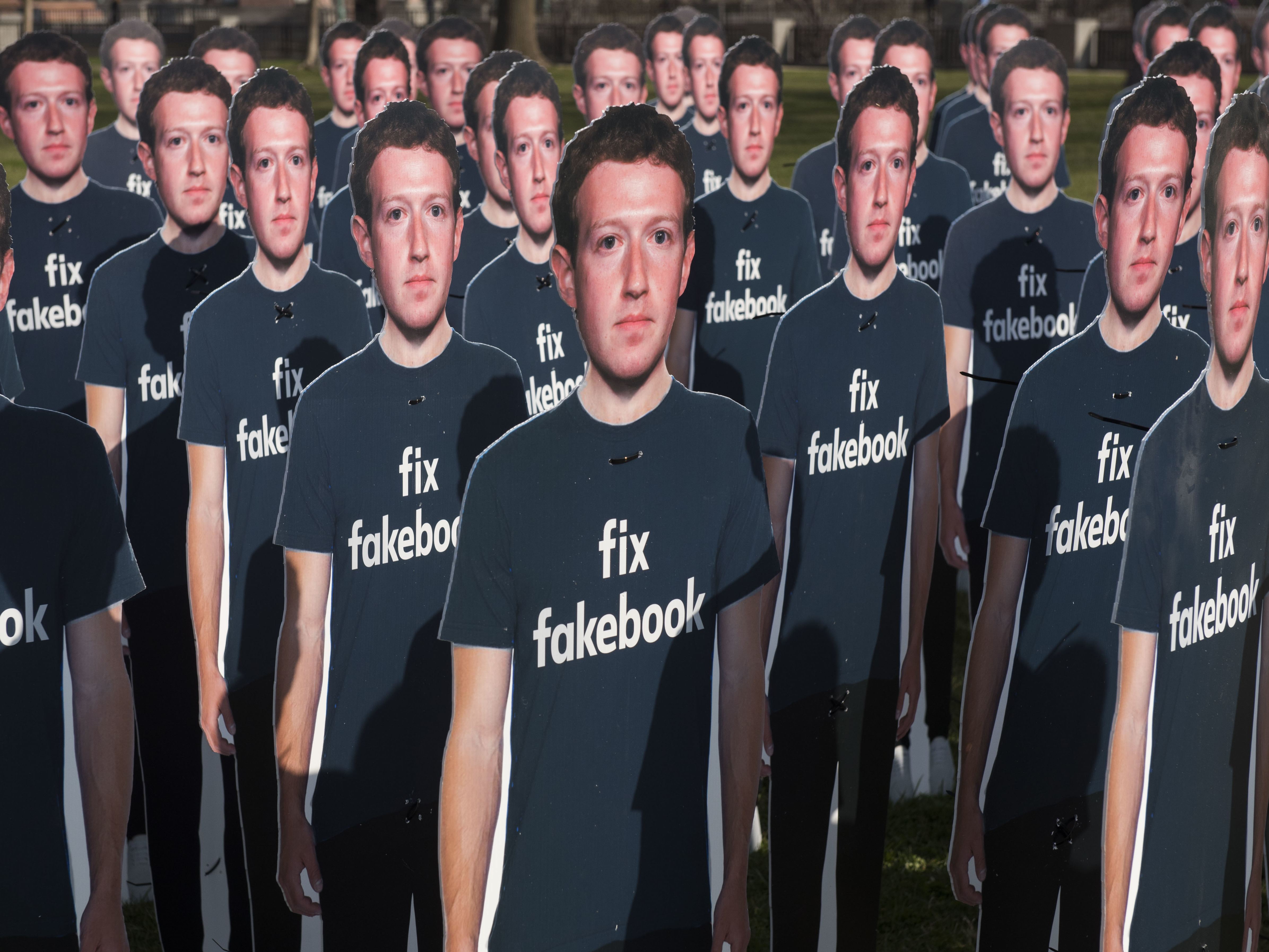 Cardboard cutouts of Facebook founder and CEO Mark Zuckerberg stand outside the U.S. Capitol in Washington as he testified before a Senate panel last week. (Photo by Kevin Wolf/Associated Press)