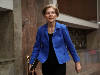 Sen. Elizabeth Warren arrives at a confirmation hearing before the Senate Armed Services Committee on March 1.
