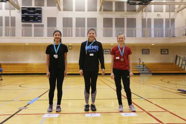 Female Kneel Jump Middle School Division winners Trinity Jackson, Kalila Arreola, and Skylar Tuckwood at the 2018 Traditional Games. The contest was sponsored by Sealaska Heritage, Central Council of Tlingit and Haida Indian Tribes of Alaska and Wooch.Een in collaboration with Goldbelt Heritage. (Photo by Annie Bartholomew/KTOO)