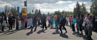 Athabascan drummers Travis Cole, Sunny Luke and Norman Carlo lead protesters to the Carlson Center in Fairbanks on Tuesday, May 29, 2018. The Bureau of Land Management was meeting on the federal plan to lease portions of the ANWR coastal plain for oil and gas development.