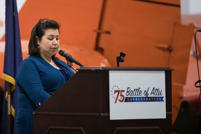Crystal Dushkin speaks at the closing ceremonies of a 75-year anniversary commemoration of the Battle of Attu in 2018.
