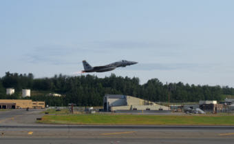 An fighter jet taking off from Joint Base Elmendorf-Richardson during exercises in 2015. (Photo by Zachariah Hughes/Alaska Public Media)
