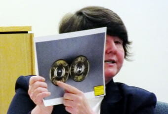 Firearm and tool mark examiner Debra Gillis shows the jury how a quarter- and half-cocked revolver hammer impacts cartridges differently. Gillis testified May 9, 2018 in the Mark DeSimone homicide trial in Juneau Superior Court.