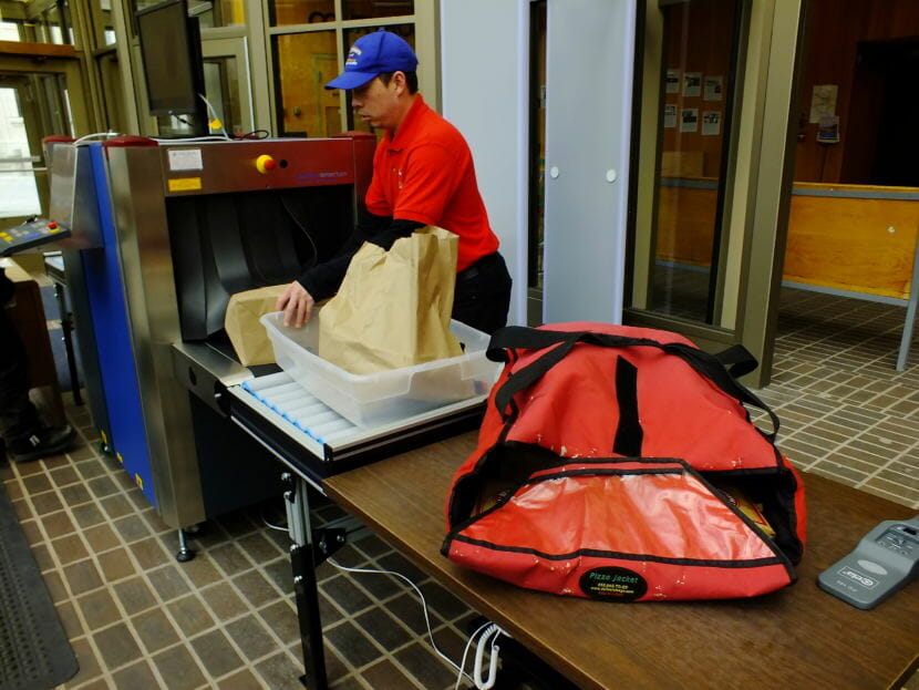 Bullwinkle's delivery driver arrives at the Dimond Courthouse with pizza, sandwiches, popcorn, and Cokes for the jury's first day of deliberations in the Mark DeSimone homicide trial on May 10, 2018.