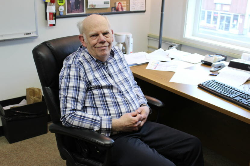 Director of Administrative Services David Means sits in his office. Means will retire at the end of June after 13 years with the Juneau School District. (Photo by Adelyn Baxter/KTOO)