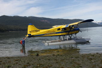 Dan Kirkwood says the part of this location's appeal is the float planes could make due without a dock. (Photo by Elizabeth Jenkins/Alaska's Energy Desk)
