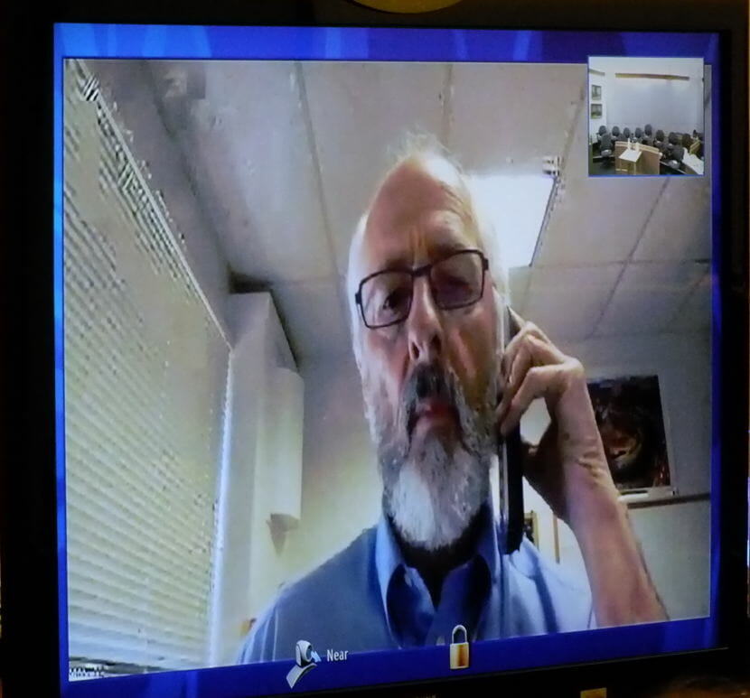 Dr. Roger Enoka of the University of Colorado testifies by videoconference May 8, 2018 in the Mark DeSimone homicide trial.