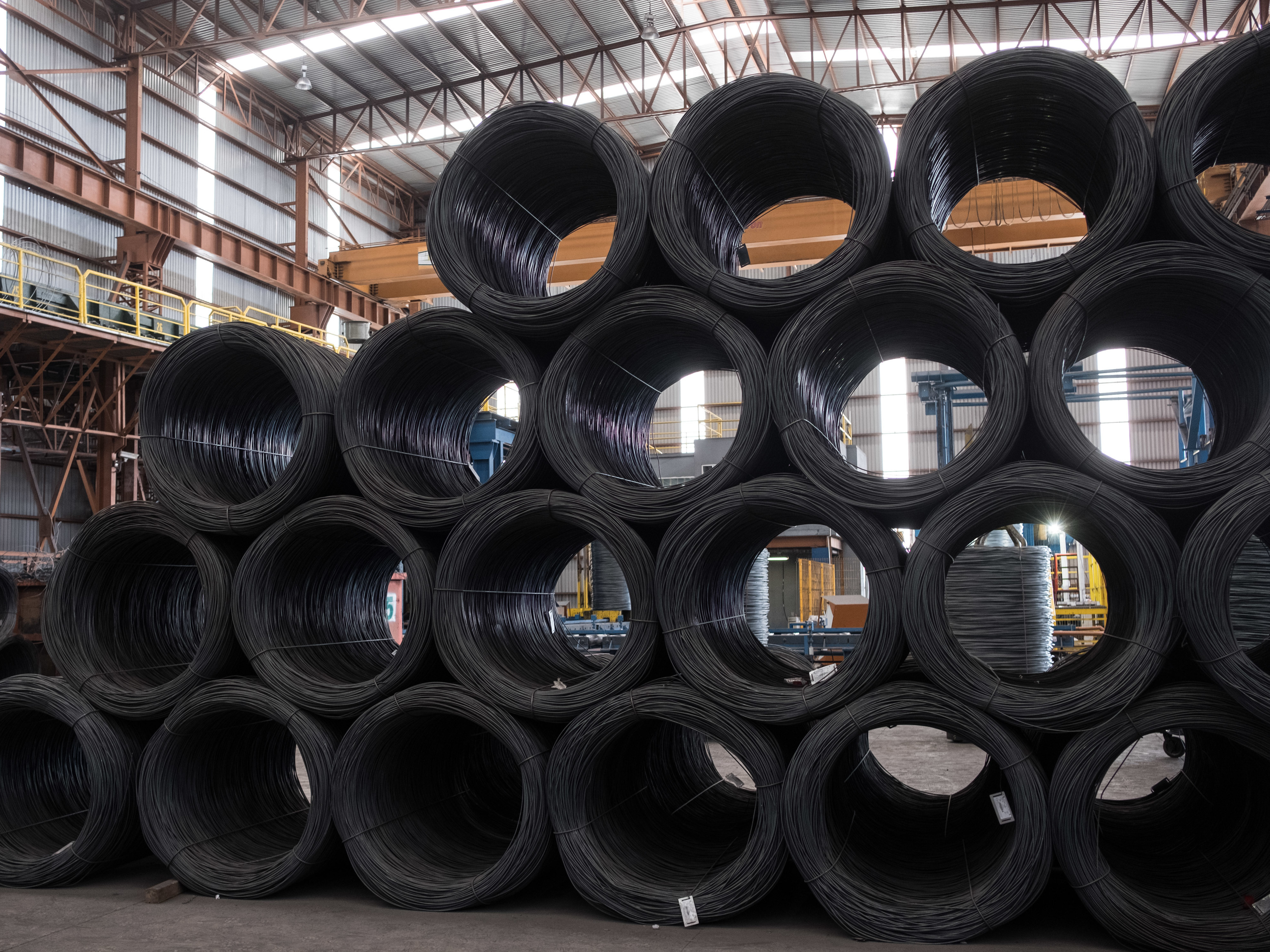 Coils of steel wire sit stacked in the shipping area of the Grupo Acerero SA steel processing facility in San Luis Potosi, Mexico, on March 6. (Photo by Bloomberg via Getty Images)