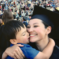Rene Schimmel celebrates her master's degree in education with Sam. She became a teacher at the public elementary school that he would also attend. (Photo courtesy Jeremy Schimmel)