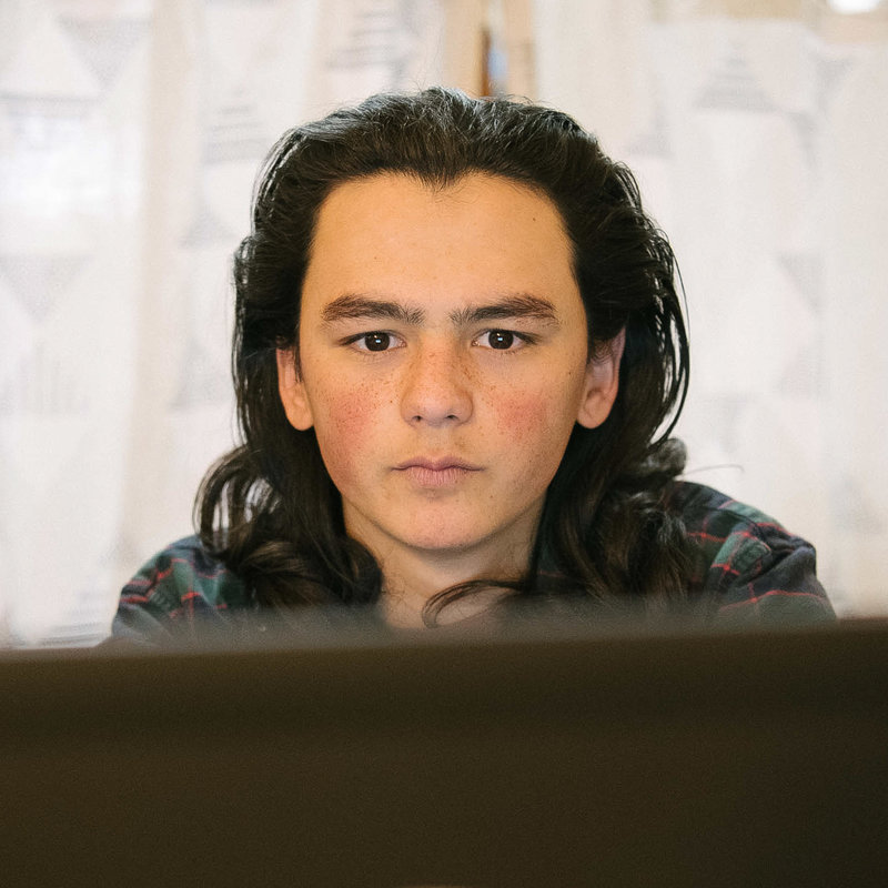 Sam Oozevaseuk Schimmel, 18, has grown up in both Alaska and Washington state. He is an advocate for Native Alaskan youth. (Photo by Kiliii Yuyan for NPR)